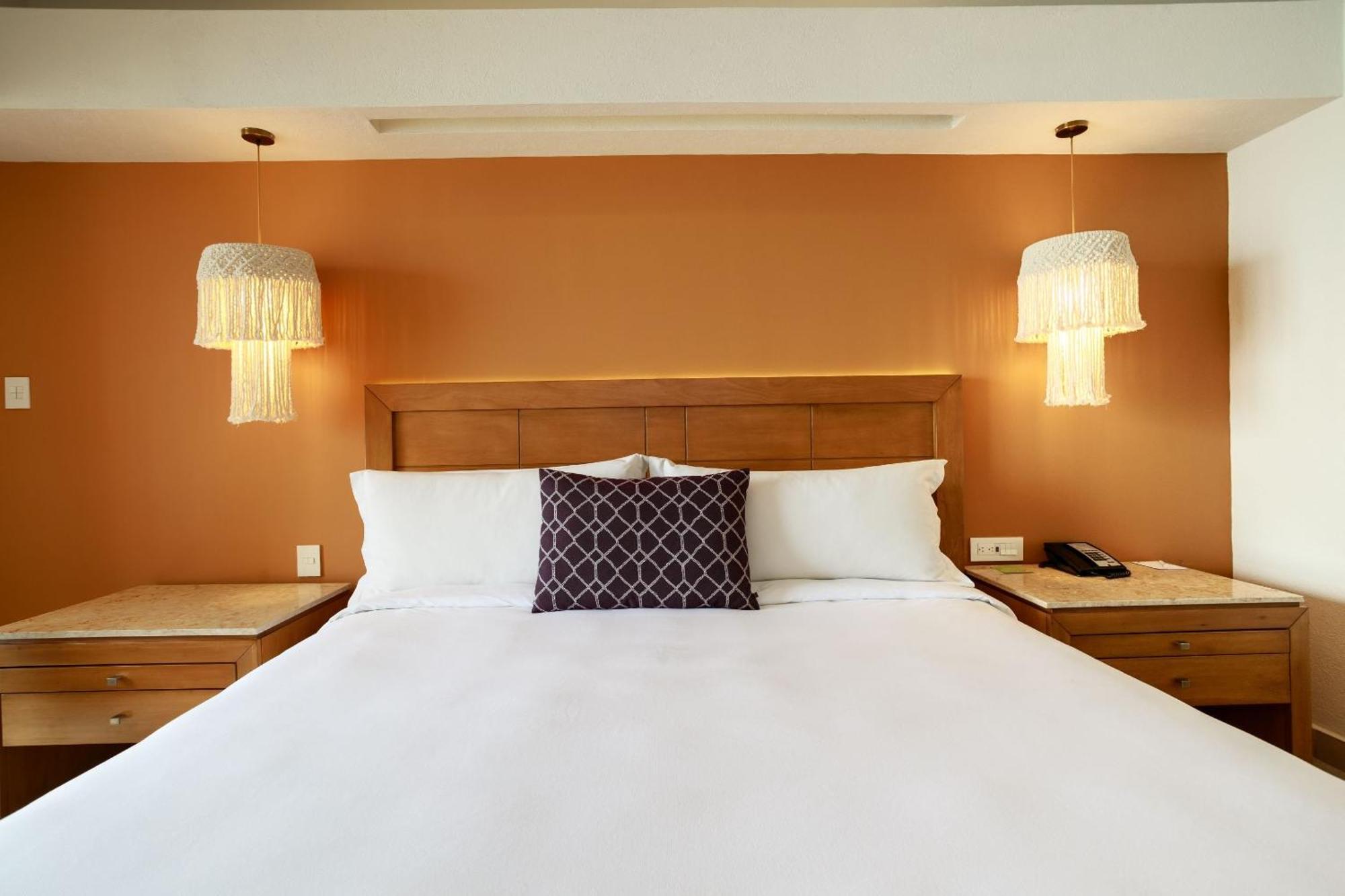 فندق كامينو ريال فيراكروز المظهر الخارجي الصورة A bedroom at the hotel